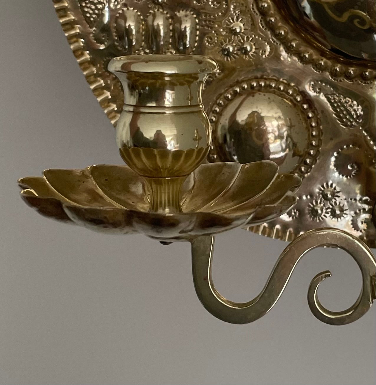 Pair of vintage embossed Swedish brass double wall sconces