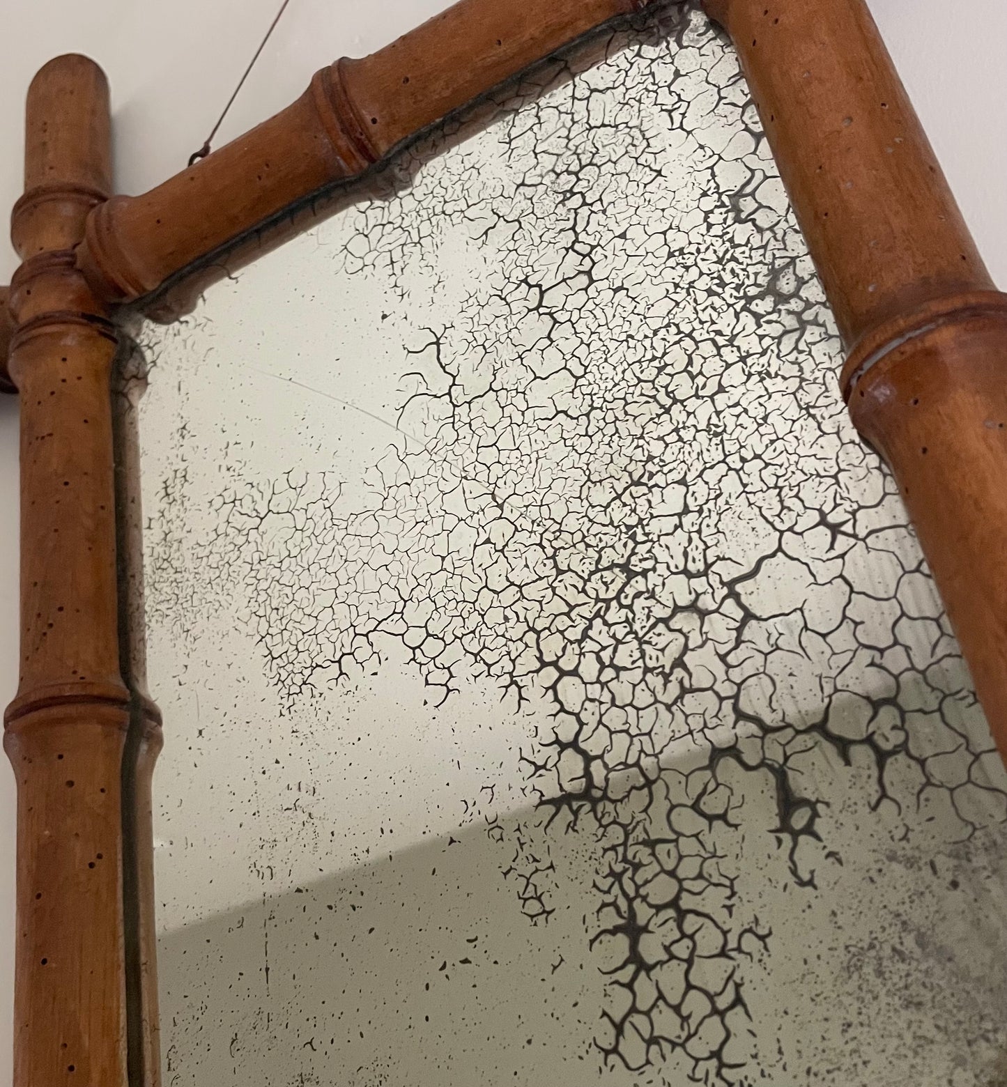 Vintage small wooden bamboo mirror with foxing