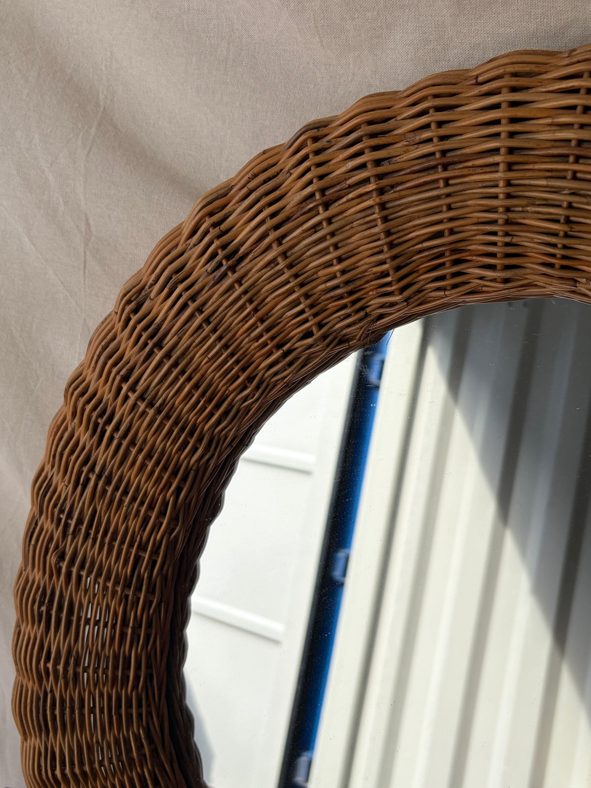 Vintage round wicker mirror