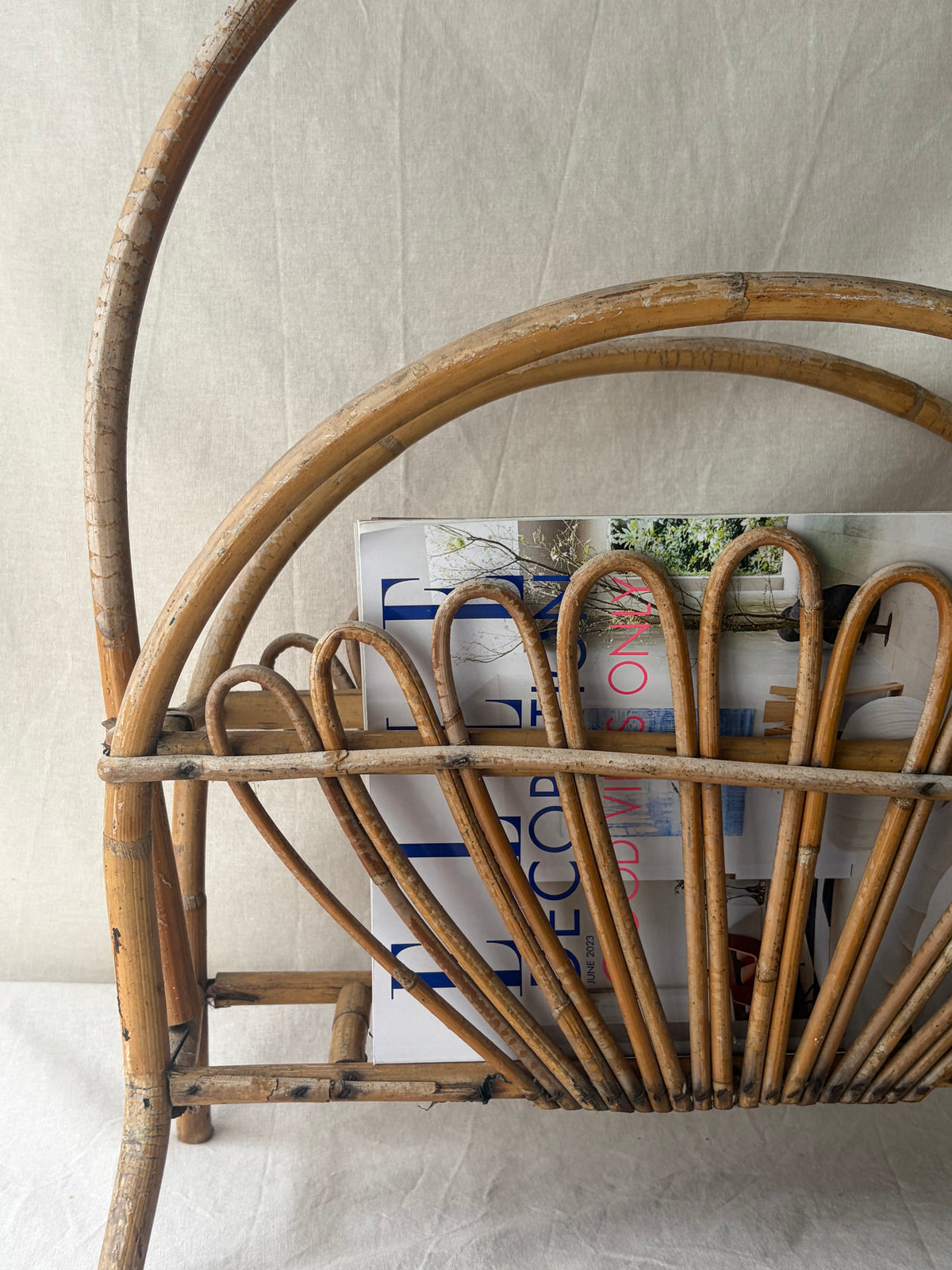 Vintage sunburst 1960’s bamboo and rattan magazine rack, Franco Albini style