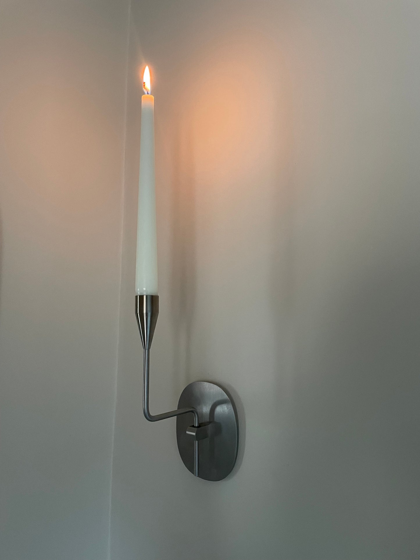 Pair of vintage stainless steel candle sconces by Piet Hein