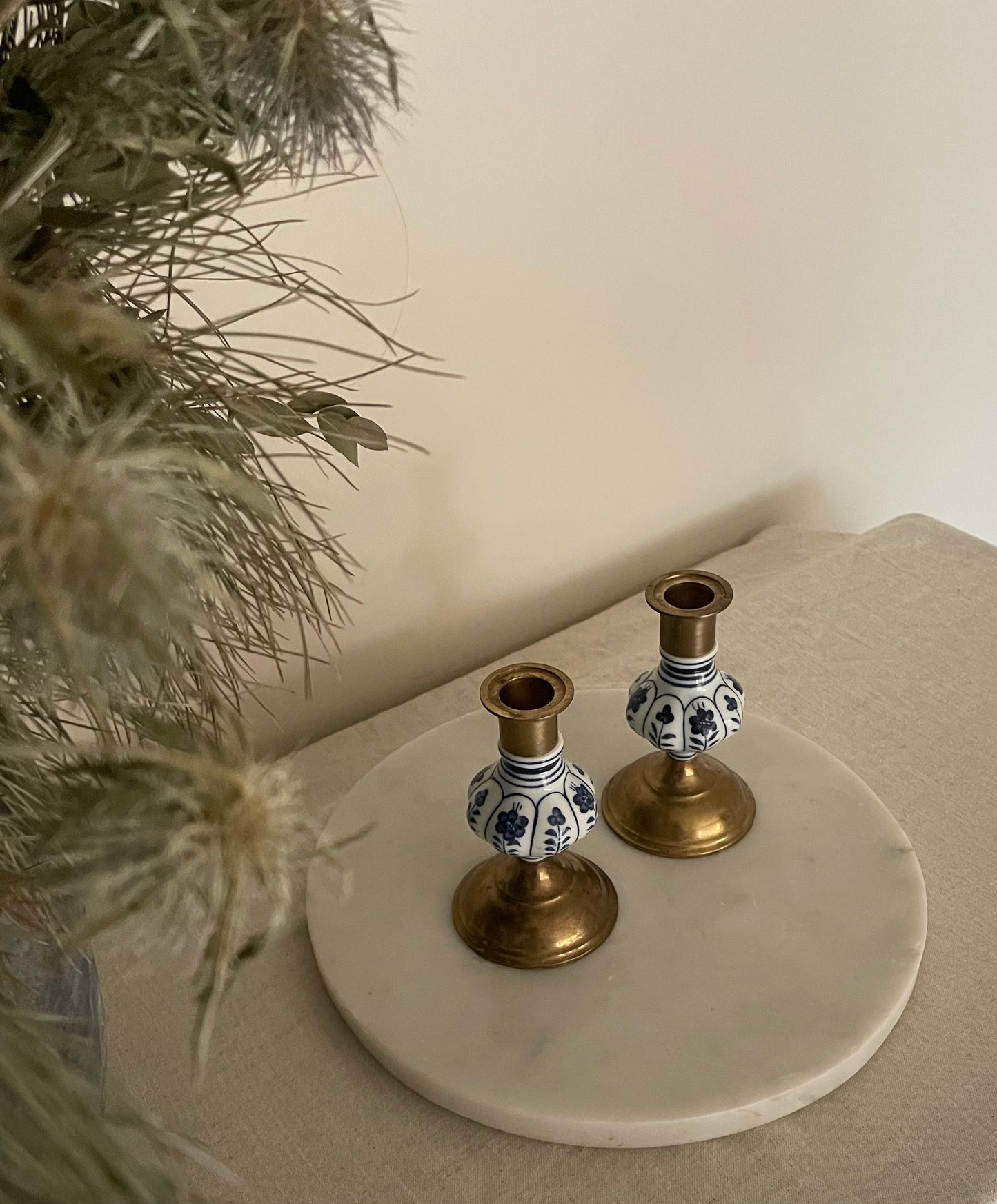 Vintage brass and ceramic small candlestick holder with blue hand painted flowers