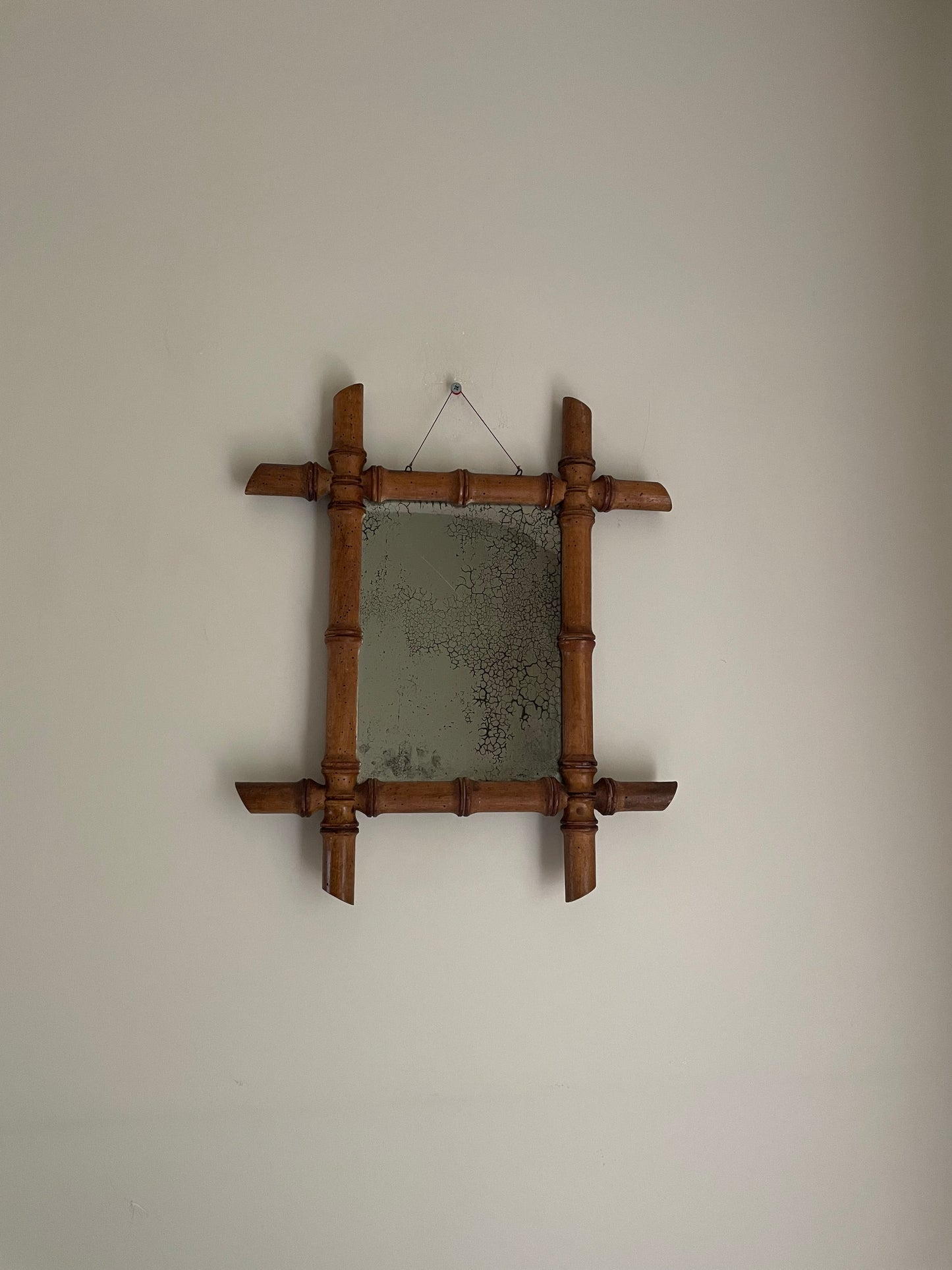 Vintage small wooden bamboo mirror with foxing