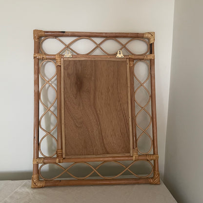 Bamboo and rattan vertical mirror with swirls