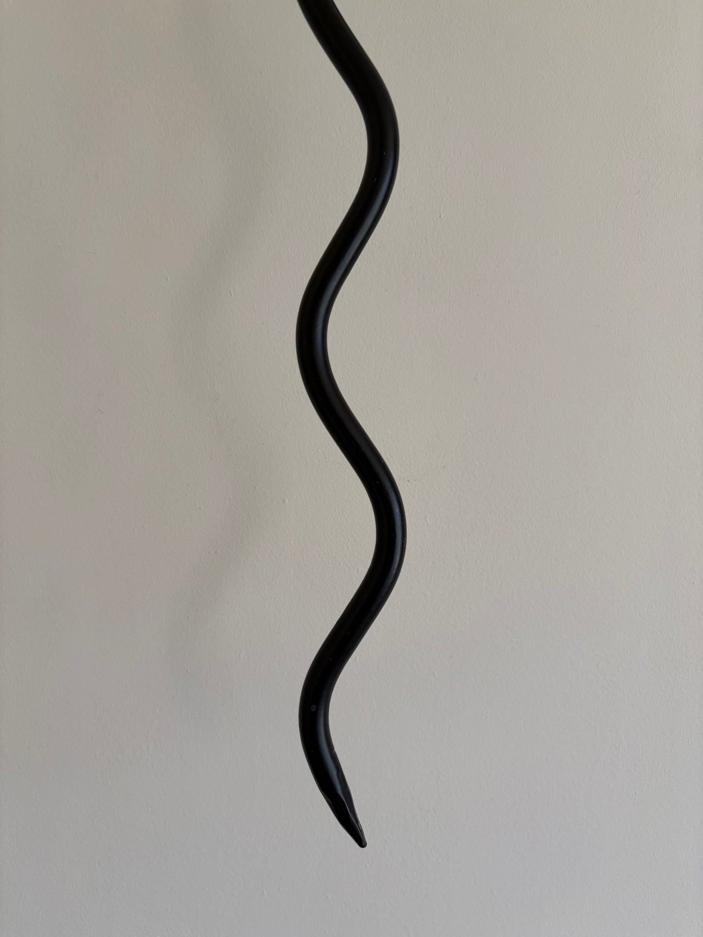 Pair of vintage wrought iron black squiggle candle wall sconces