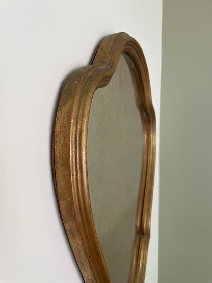 Scalloped wooden gilt wall mirror