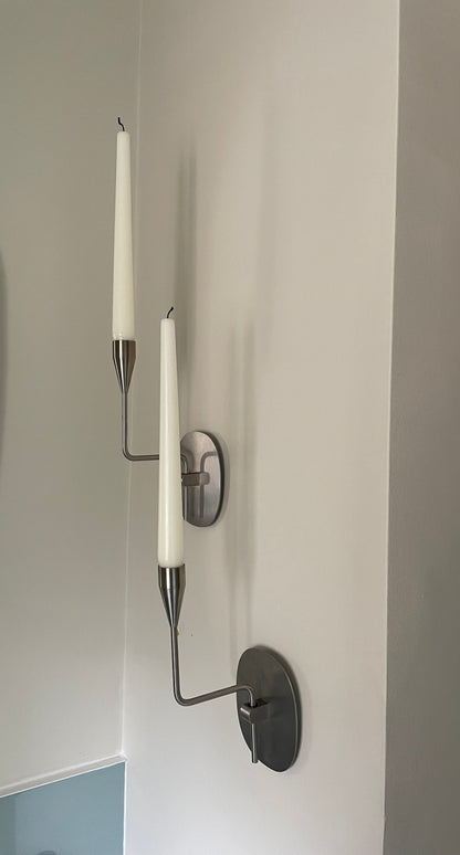 Pair of vintage stainless steel candle sconces by Piet Hein
