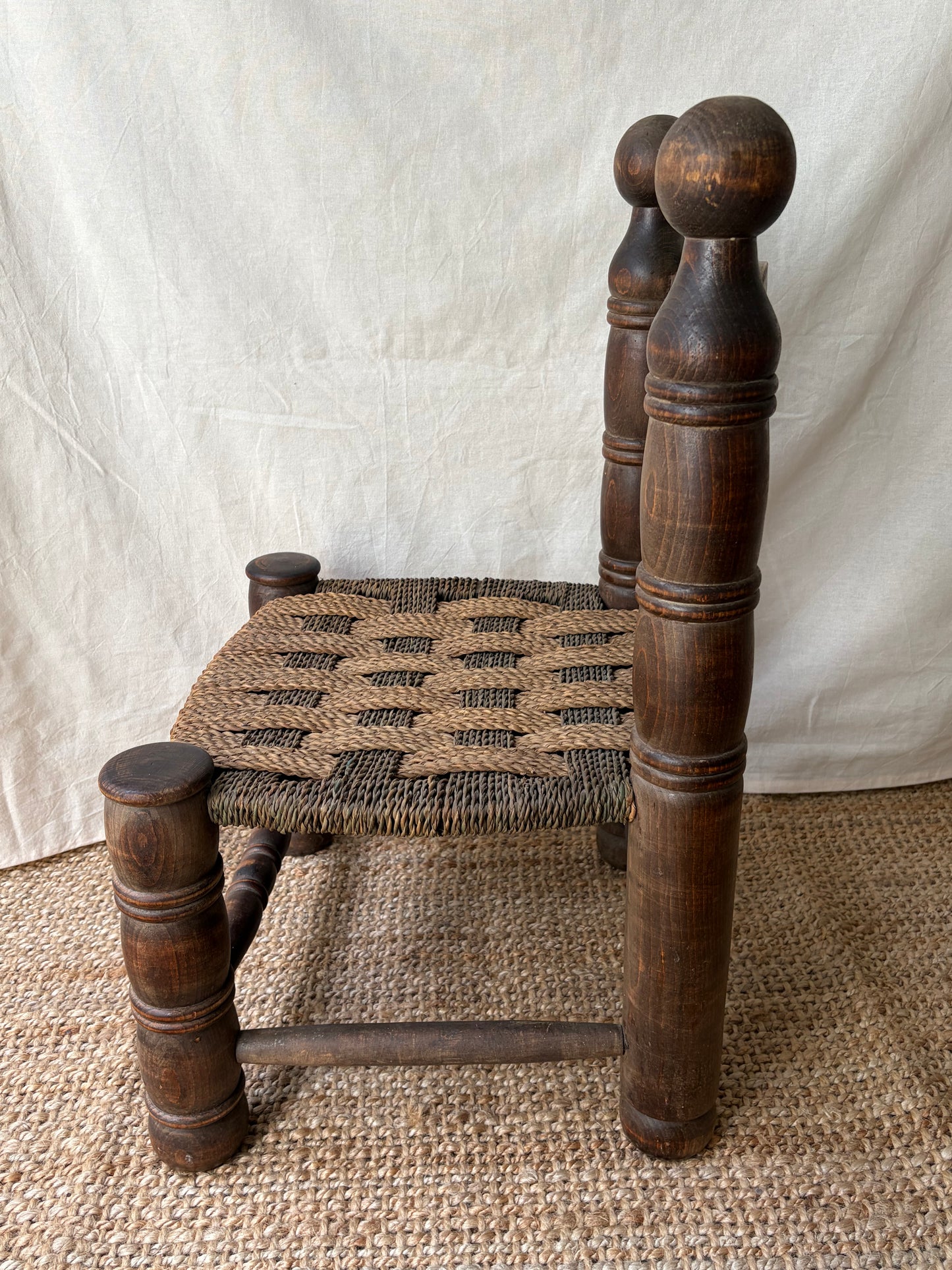 Low oak rush-seat chair attributed to Charles Dudouyt