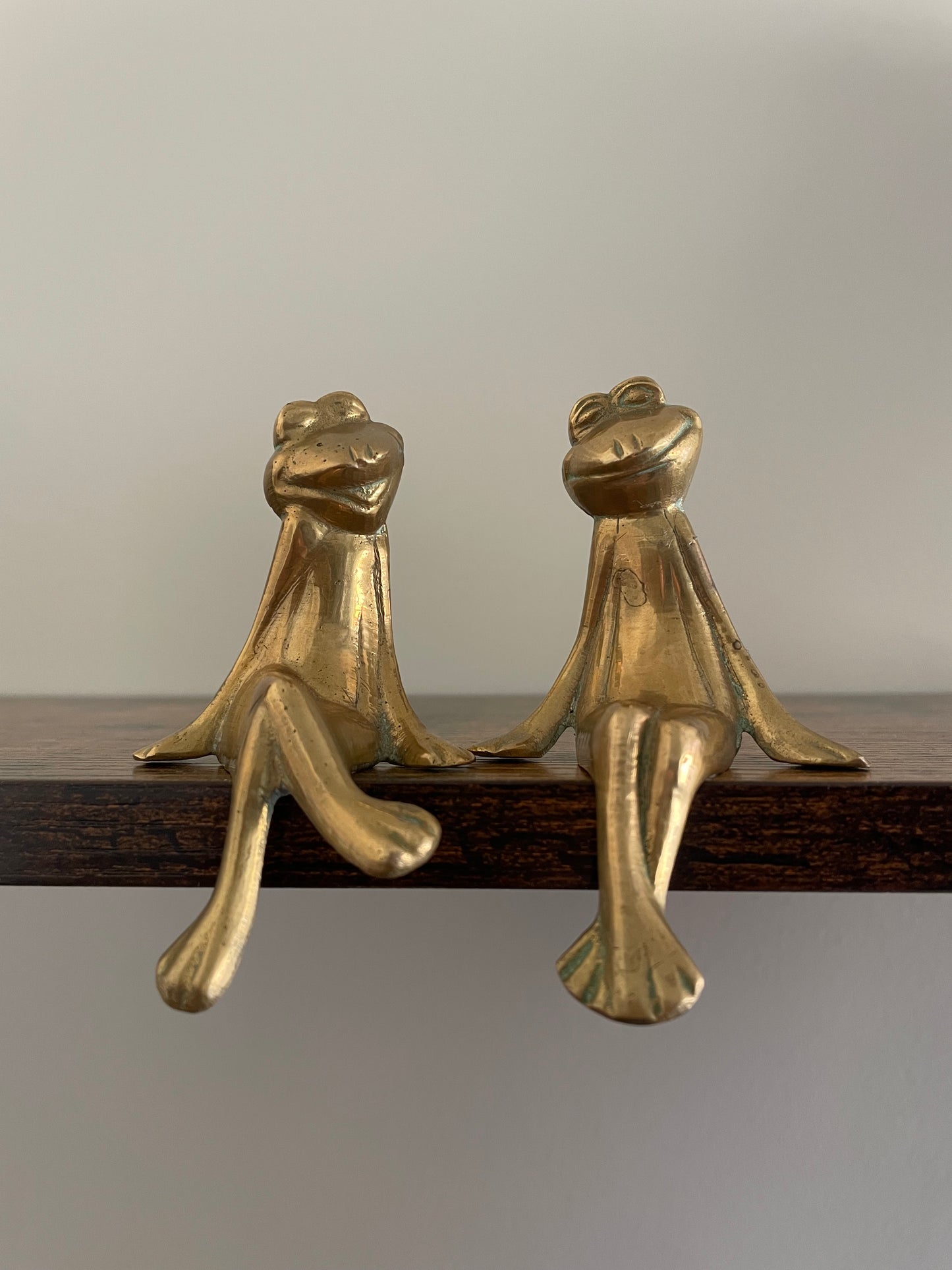 Pair of brass frogs