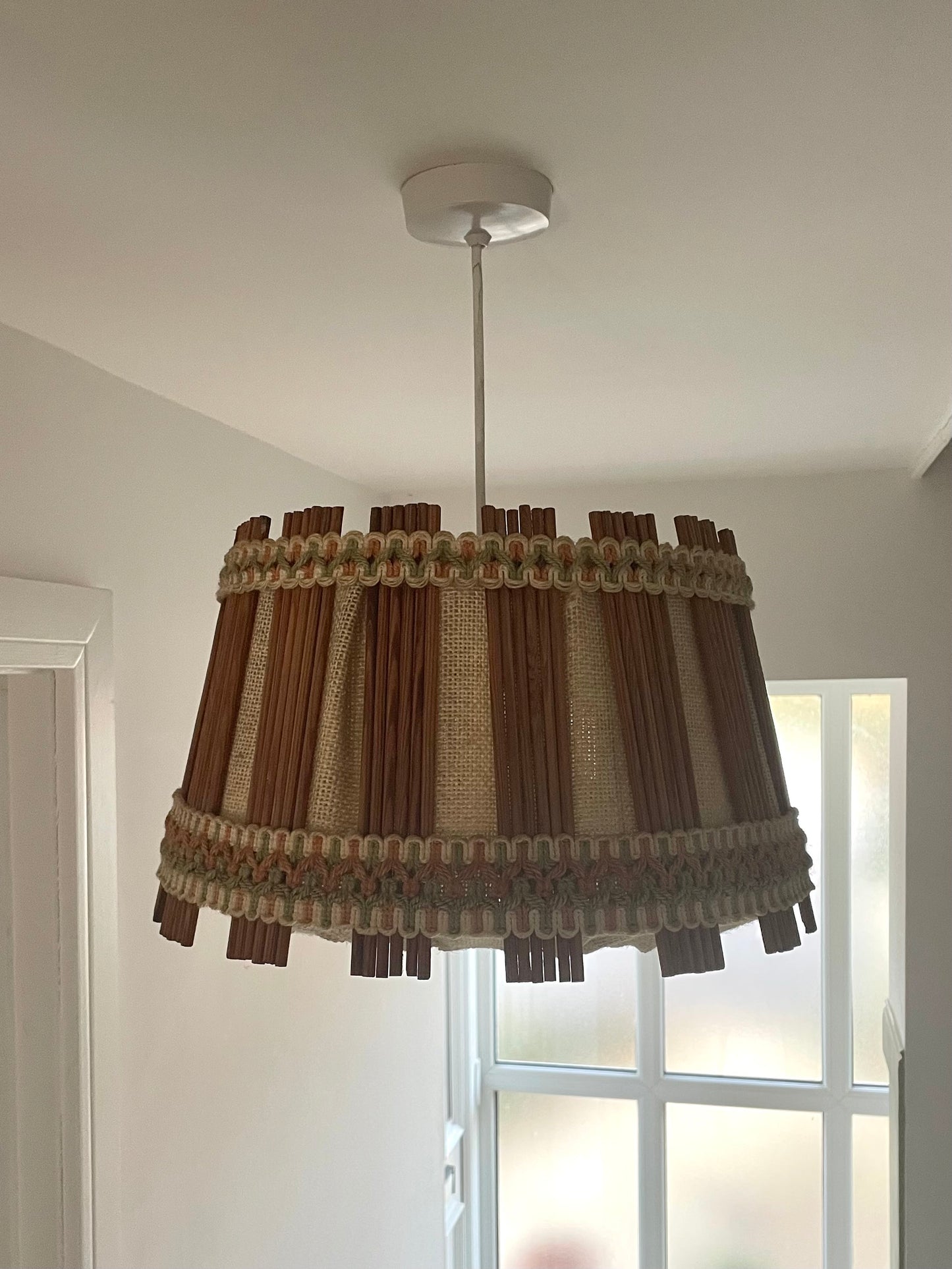 Wooden round lampshade with embroidery detail