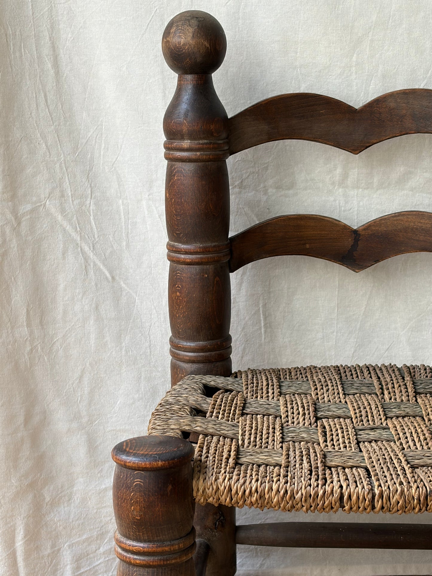 Low oak rush-seat chair attributed to Charles Dudouyt