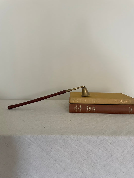 Brass and wooden candle snuffer