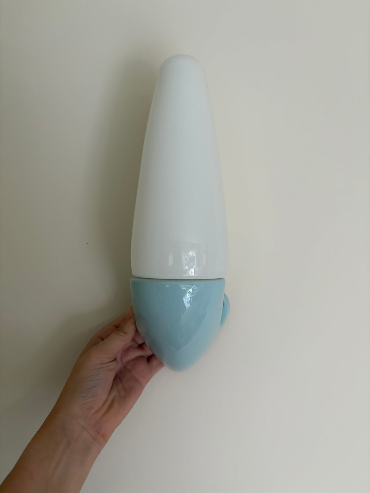 Pair of Sigvard Bernadotte blue ceramic wall lights