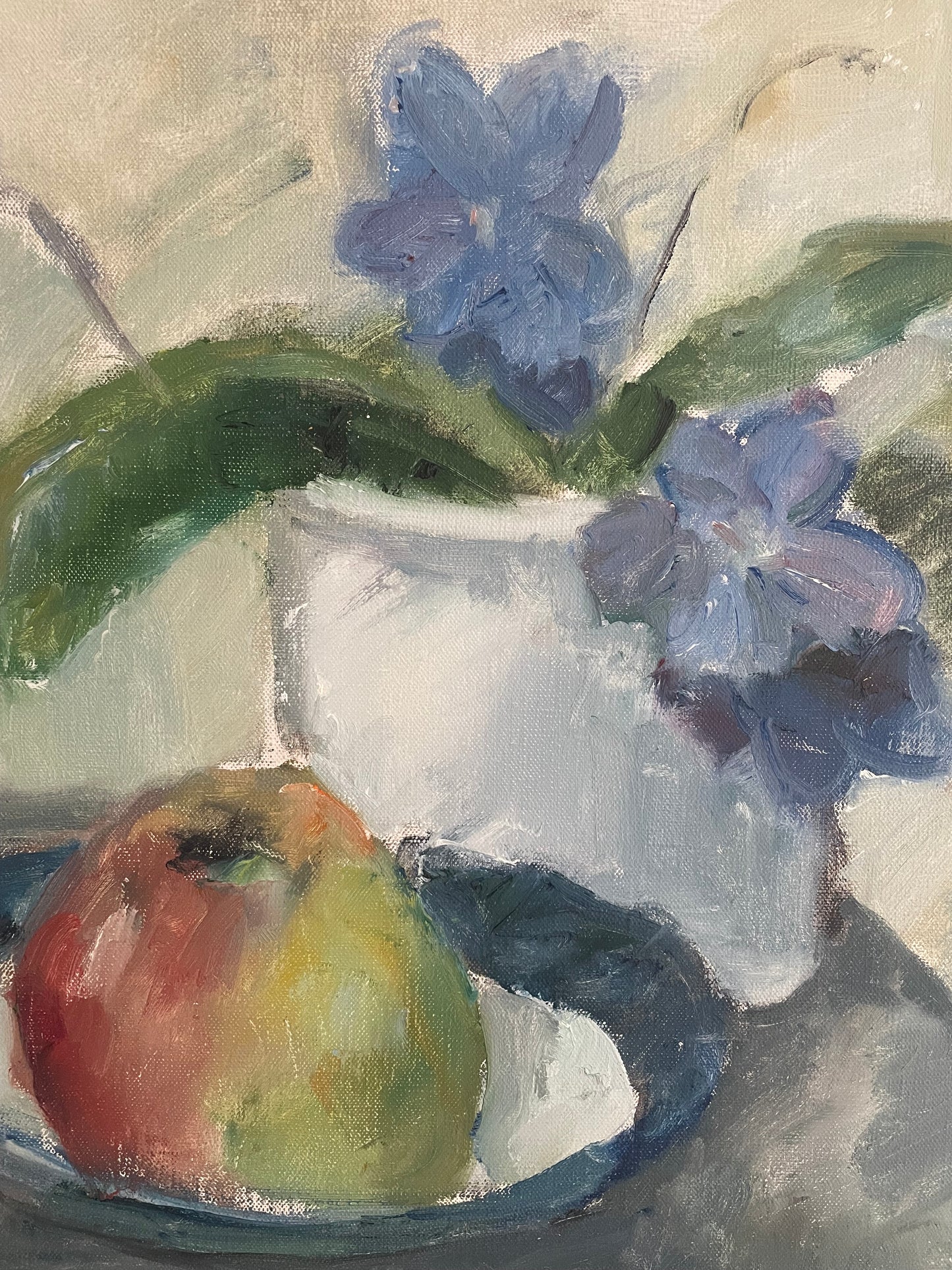 Still life of apple and violets