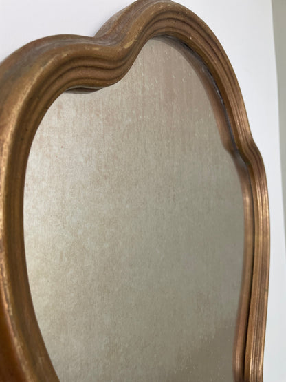 Scalloped wooden gilt wall mirror