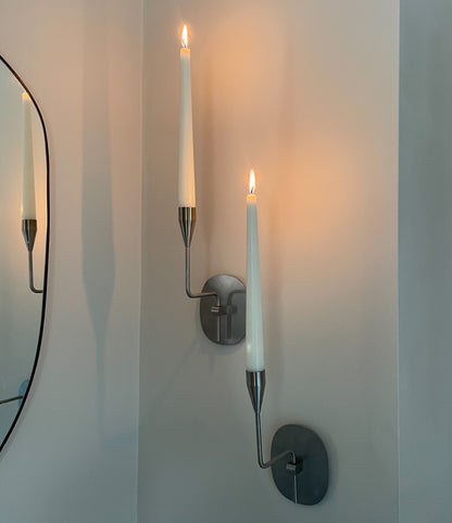 Pair of vintage stainless steel candle sconces by Piet Hein