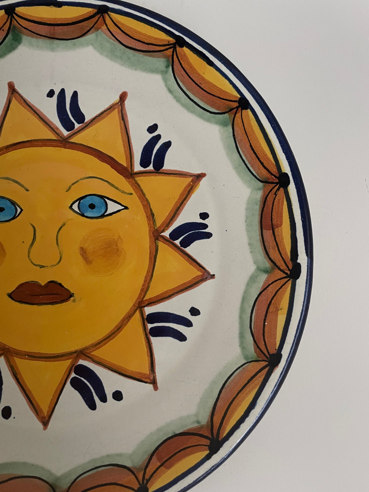 Vintage hand painted Mexican wall plate of sun