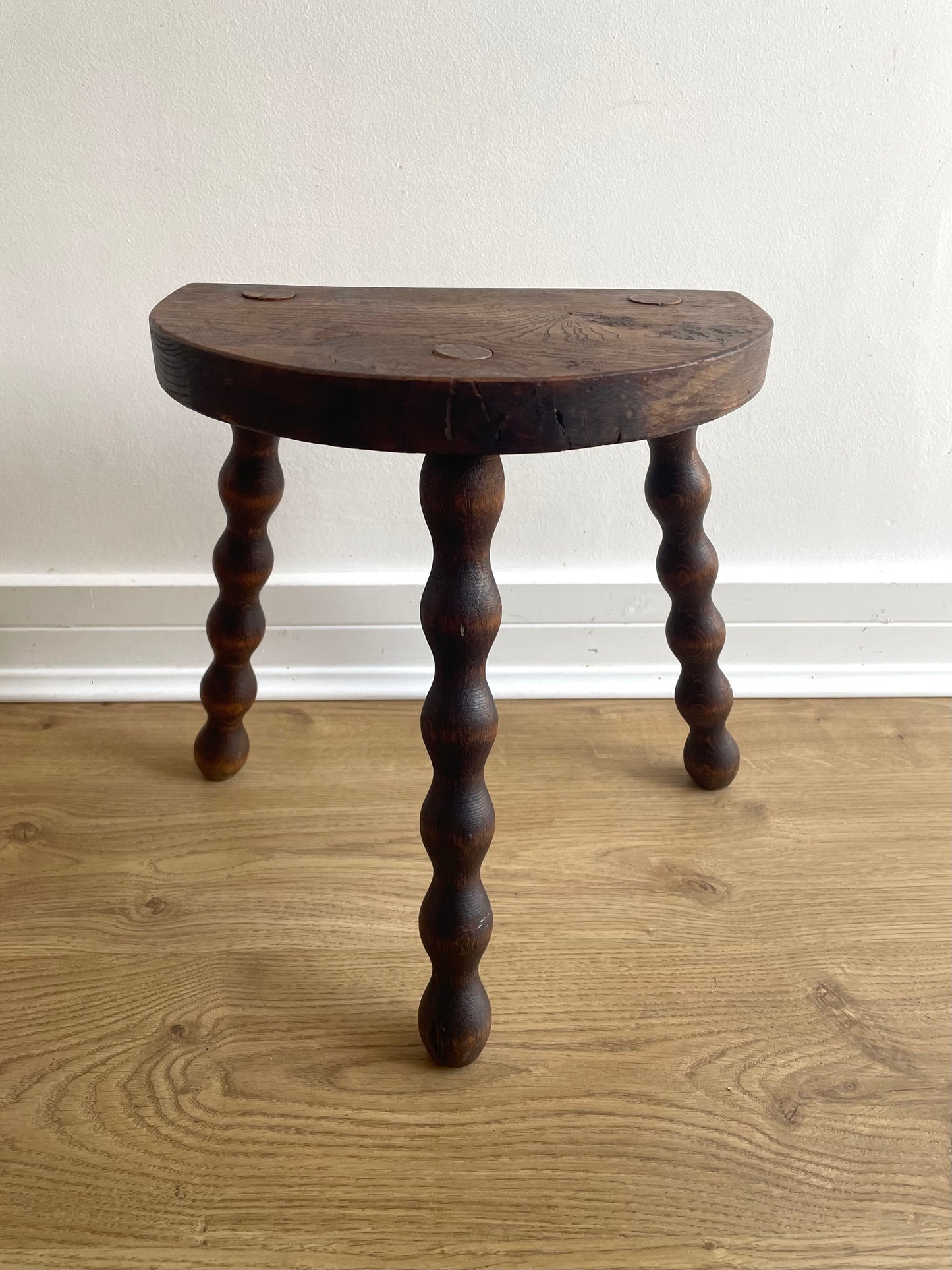 Small wooden half-moon bobbin tripod stool