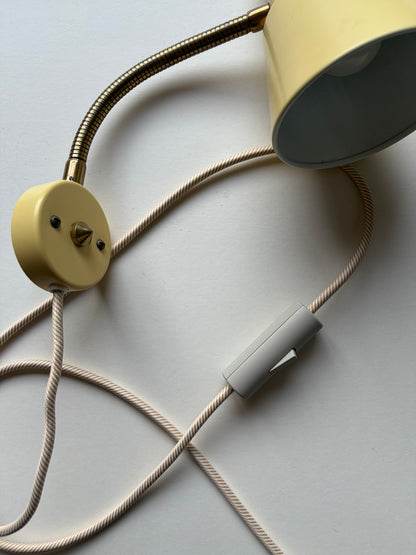 Vintage butter yellow small midcentury wall light with brass gooseneck