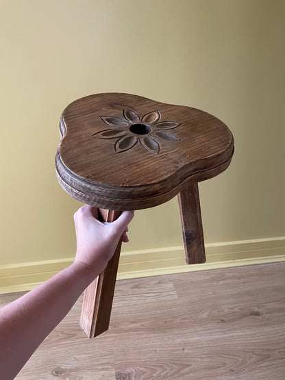 Vintage French wooden milking stool with carved flower