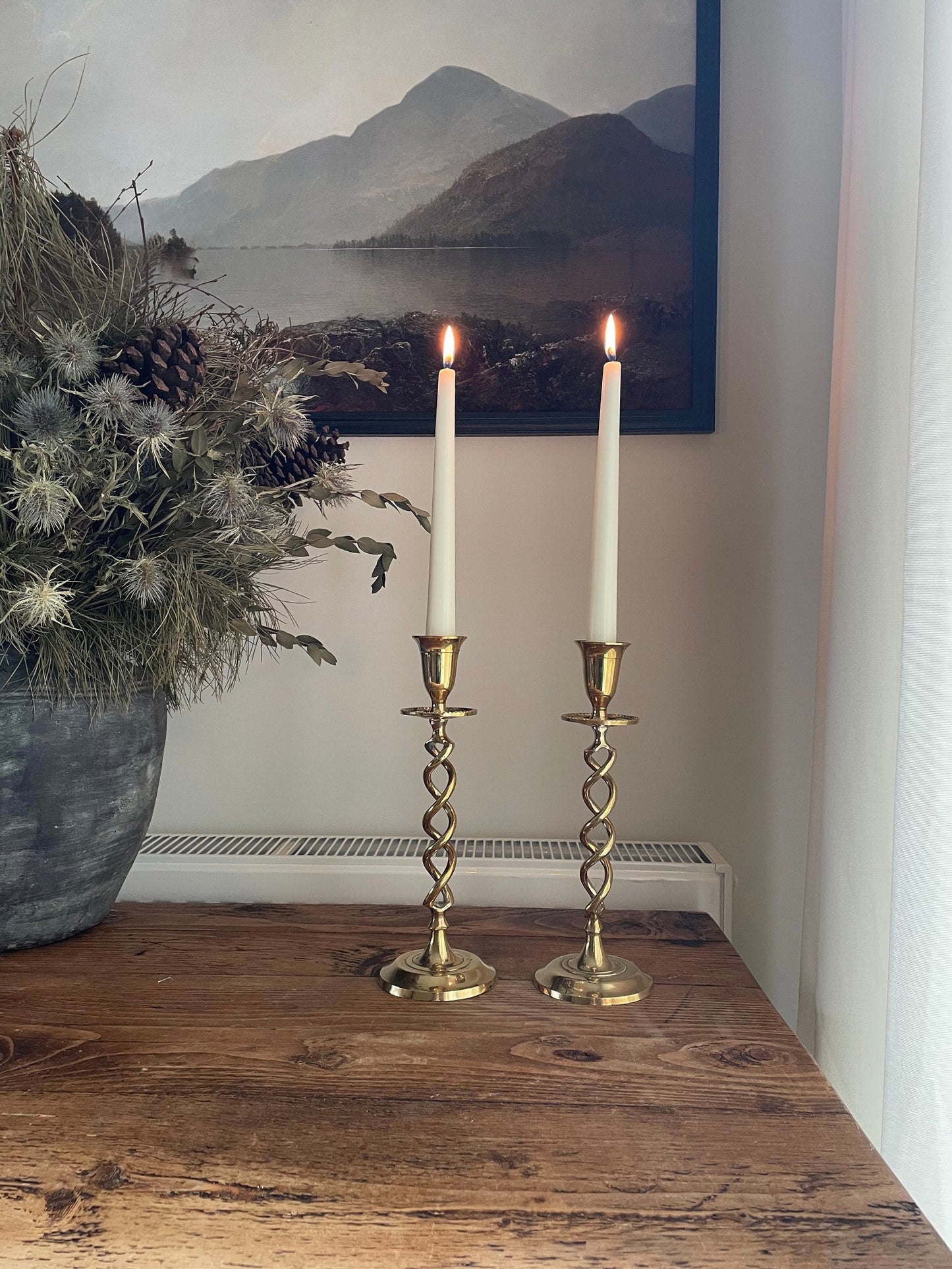 Pair of vintage brass twisted candlestick holders with drip tray for candle wax