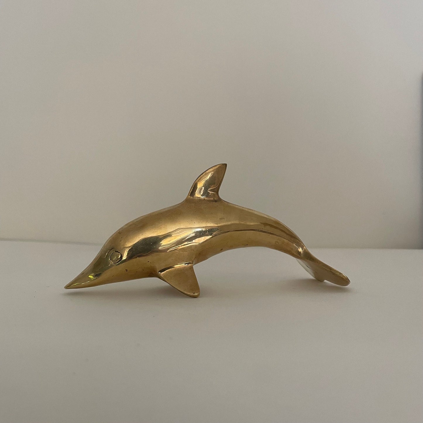 Vintage brass dolphin statue, figurine