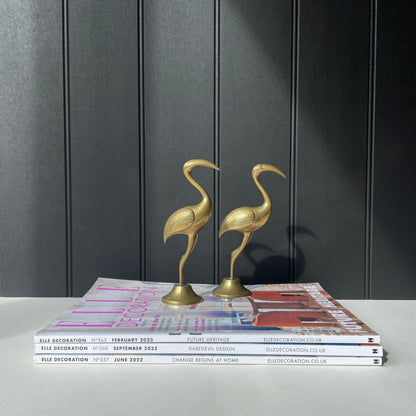 Vintage pair of solid brass bird sculpture of cranes/flamingos