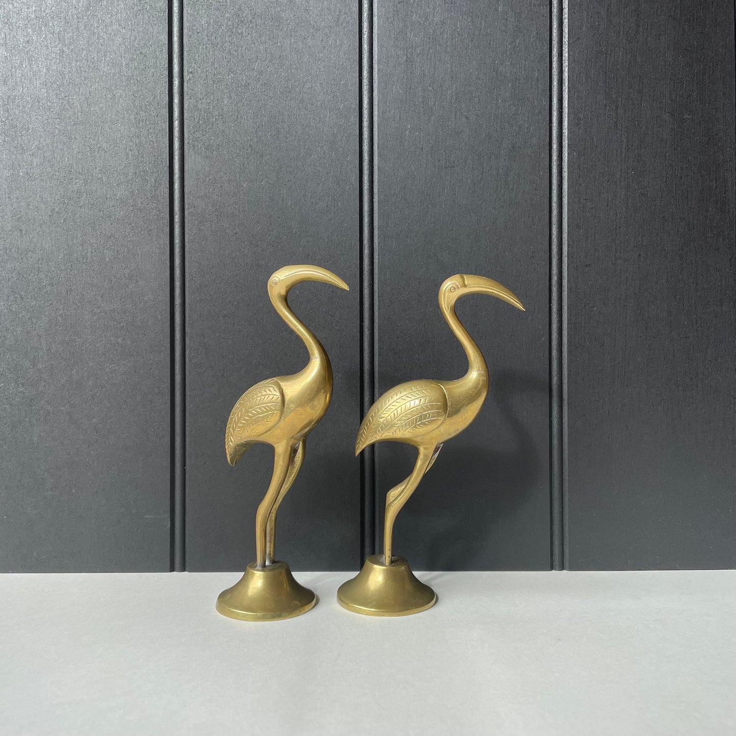 Vintage pair of solid brass bird sculpture of cranes/flamingos