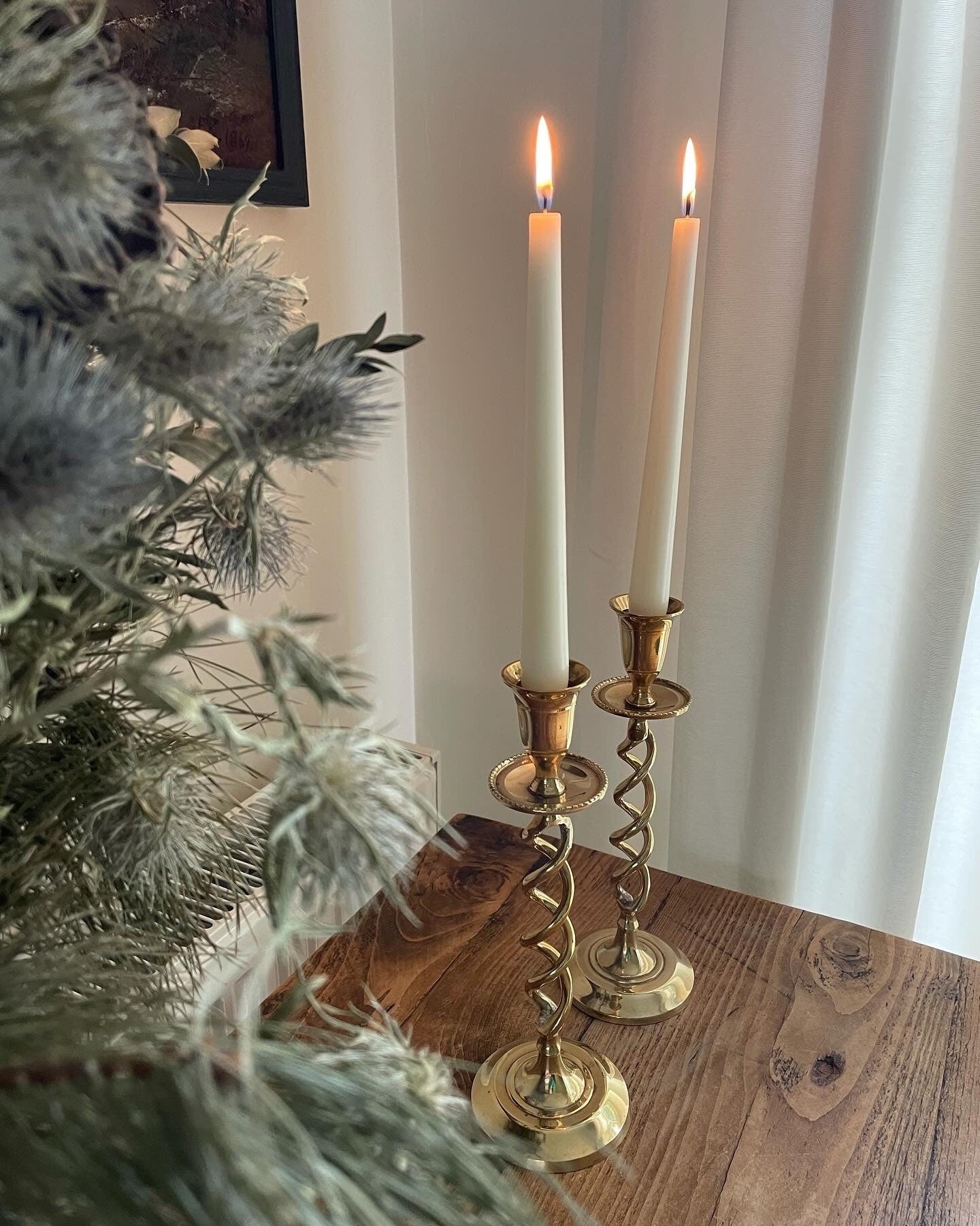 Pair of vintage brass twisted candlestick holders with drip tray for candle wax