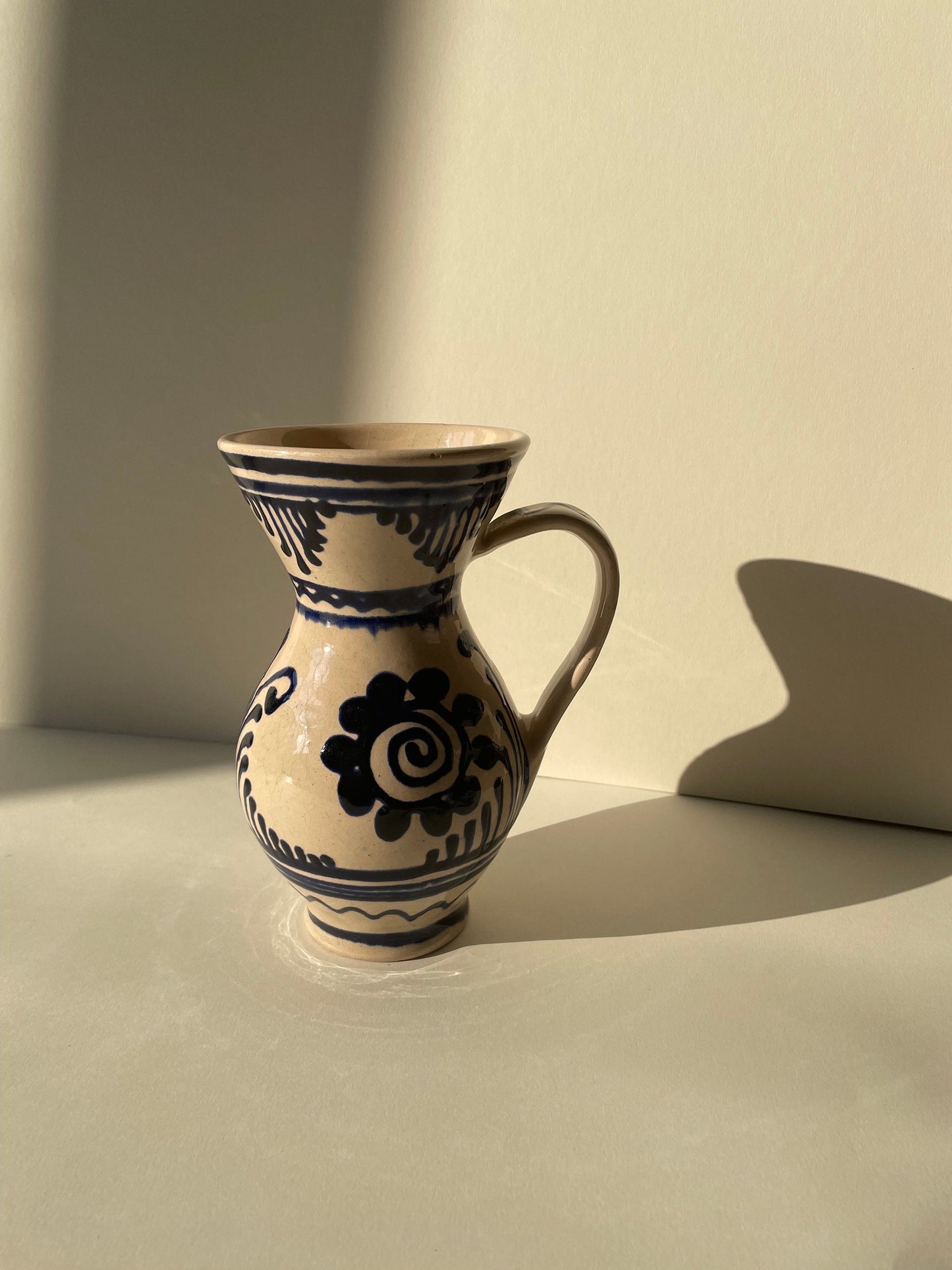 Vintage handmade ceramic pottery vase / jug with blue details