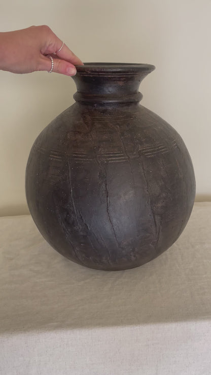 Dark wooden vintage vase