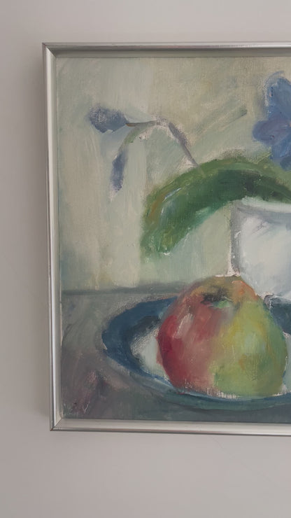 Still life of apple and violets