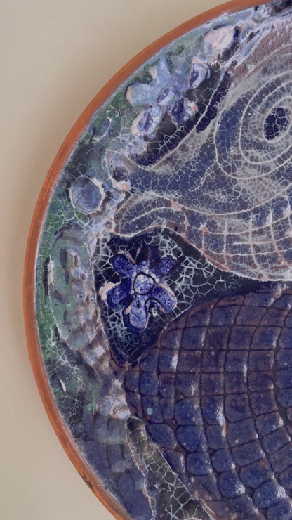 Blue wall plate of fish