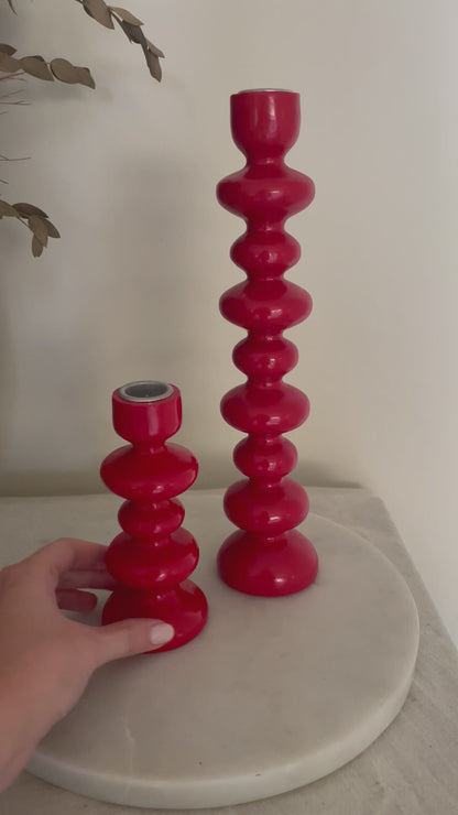 Vintage pair of red wooden bobbin candlestick holders