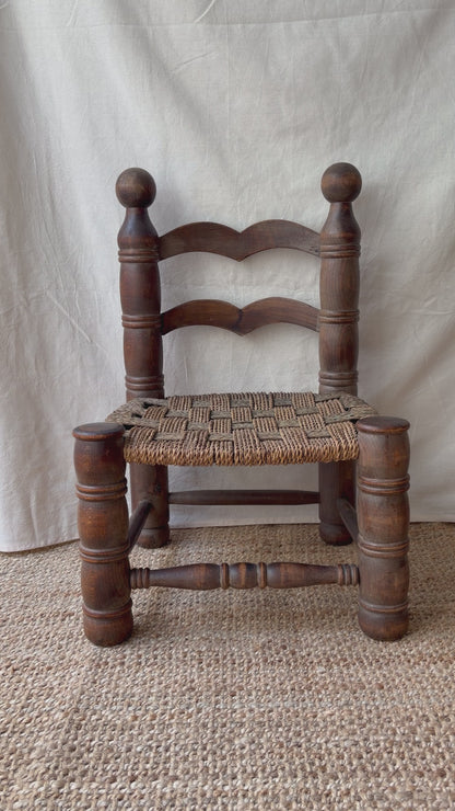 Low oak rush-seat chair attributed to Charles Dudouyt